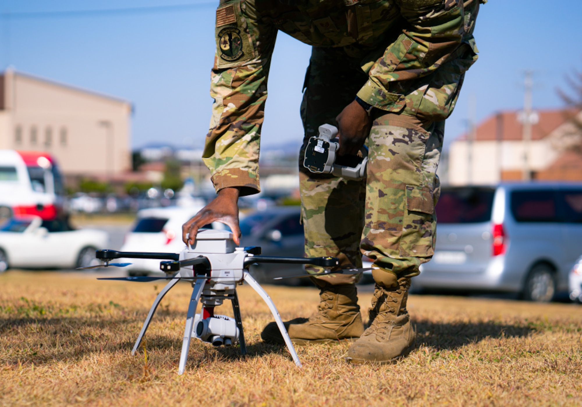 Staff Sgt. Jason Holmes, 51st Civil Engineer Squadron construction inspector, sets prepares the battery to launch a roof inspection drone outside of Turumi Lodge on Osan Air Base, Nov. 2, 2020. The 51st CES has set an Air Force benchmark as the first unit to utilize drones to inspect the thousands of roofs across an installation. (U.S. Air Force photo by 1st Lt. Daniel de La Fé)