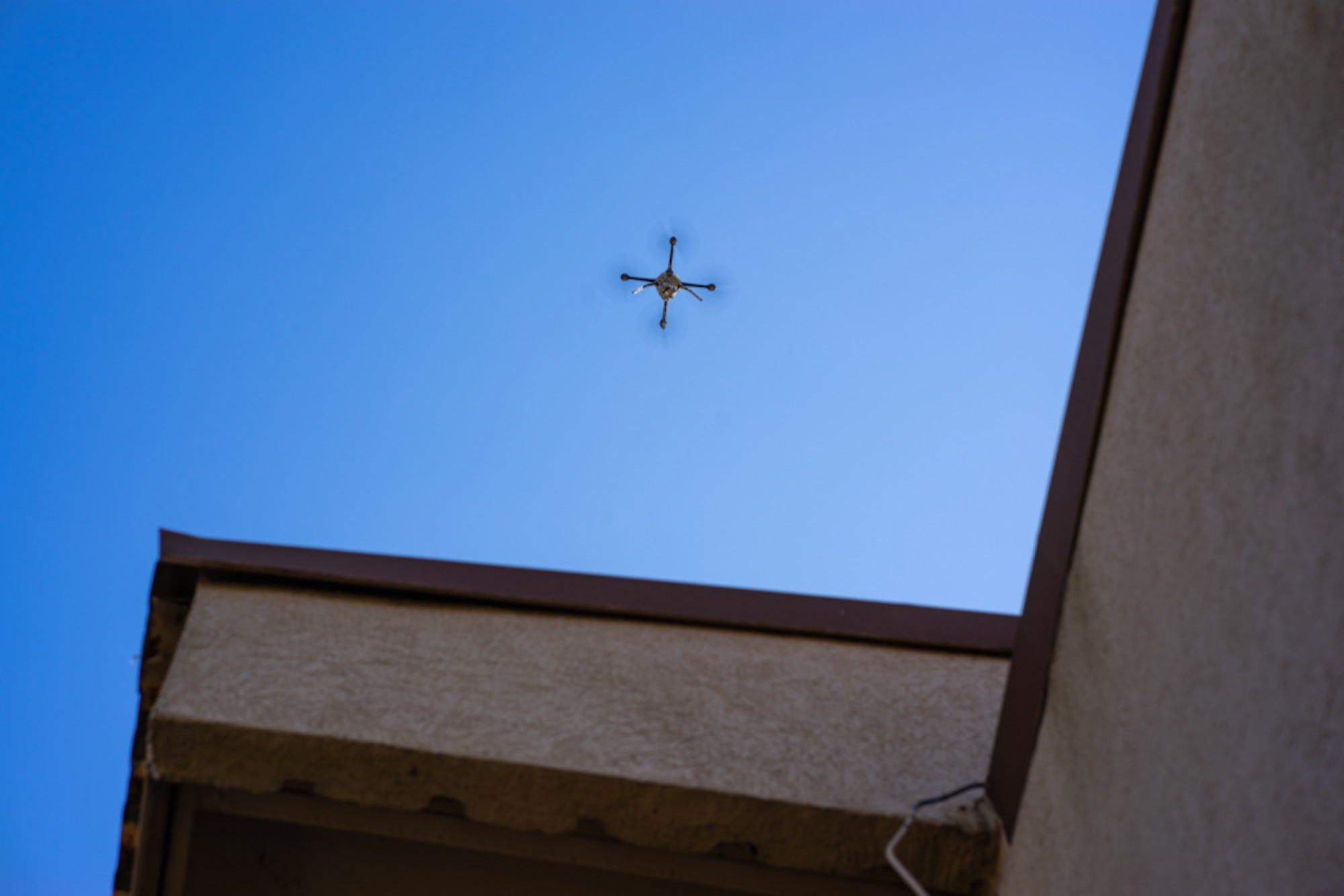 A 51st Civil Engineering Squadron drone inspects the roof of the former Safety Office at Osan Air Base, Nov. 2, 2020. The building’s roof was damaged during Typhoon Ling Ling in 2019, and the 51st CES takes special precaution to ensure the roof remains in serviceable condition with regular inspections. (U.S. Air Force photo by 1st Lt. Daniel de La Fé)
