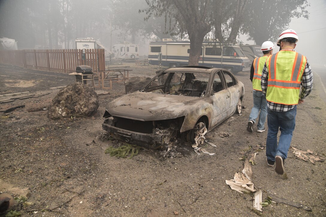 Detroit Dam operators walk through the remnants of Detroit, Ore. after the Beachie Creek Fire moved through the area, Sept. 15, 2020. The fire destroyed lives, homes, businesses and land in the North Santiam Canyon but spared the dam and other major U.S. Army Corps of Engineers infrastructure. Most of the facilities are intact and functioning, which will be important for the upcoming flood season.