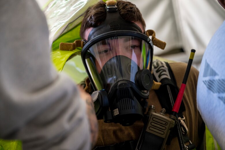 U.S. Air Force Airman 1st Class Jordan Voiles, 380th Expeditionary Civil Engineer Squadron (ECES) emergency management (EM) flight unit travel representative, prepares for a hazardous material (HAZMAT) exercise at Al Dhafra Air Base, United Arab Emirates, Dec. 18, 2020.