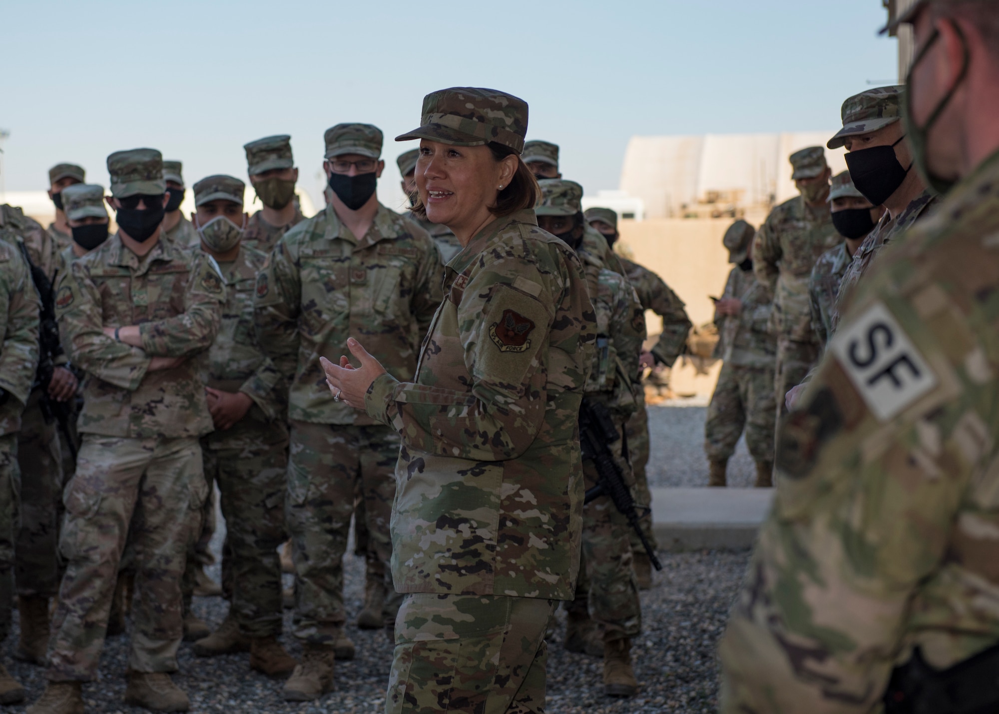 Chief Master Sergeant of the Air Force JoAnne S. Bass speaks to U.S. Air Force Airmen assigned to the 386th Expeditionary Security Forces Squadron at Ali Al Salem Air Base, Kuwait, Dec. 22, 2020. Senior leaders toured ASAB during a series of overseas visits to thank Air and Space Force personnel for their service to the nation. (U.S. Air Force photo by Senior Airman Monica Roybal)