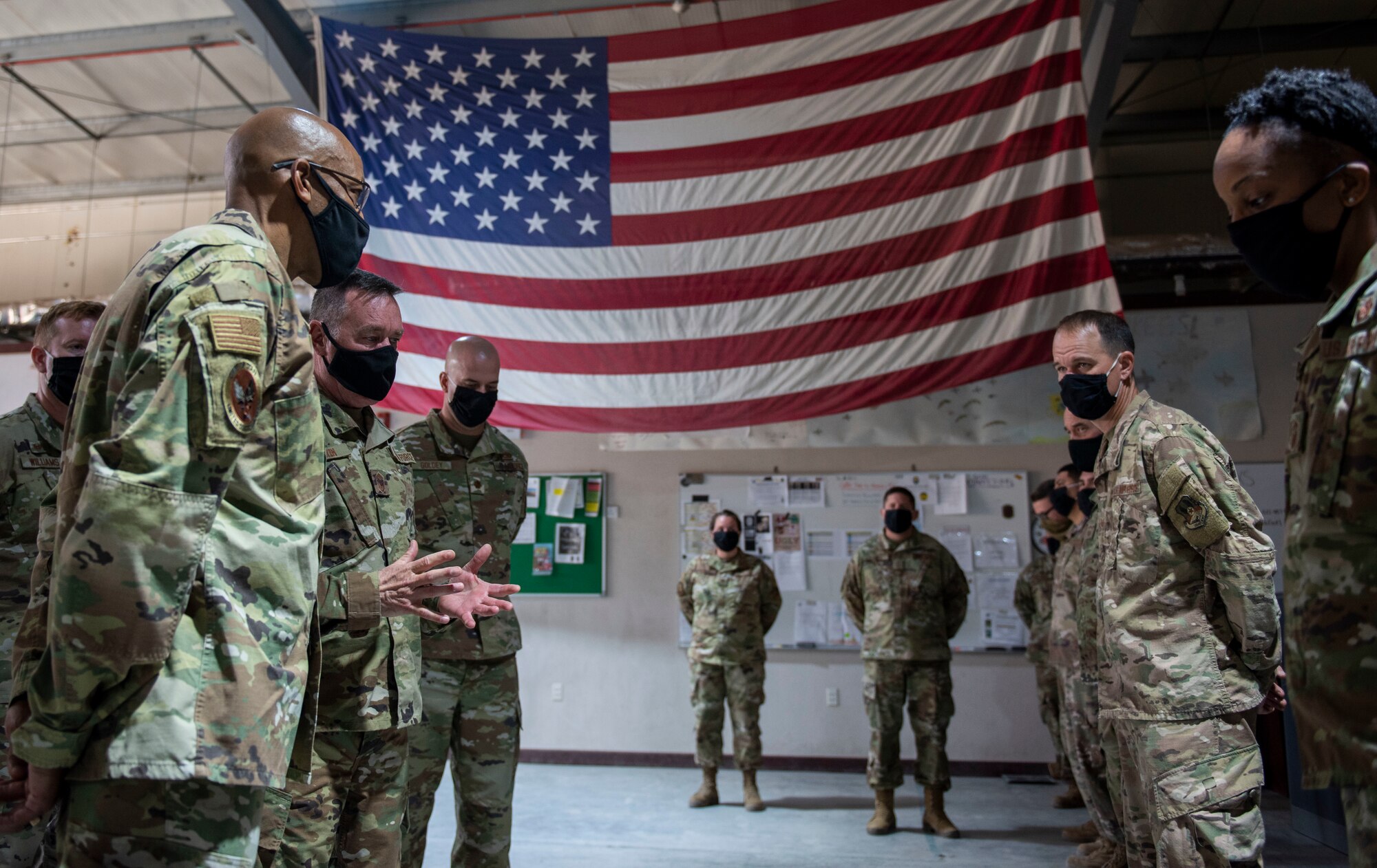 U.S. Air Force Chief of Staff Gen. Charles Q. Brown, Jr. speaks with members of the 386th Expeditionary Aircraft Maintenance Squadron during a tour at Ali Al Salem Air Base, Kuwait, Dec. 22, 2020. Senior leaders gained insight about ASAB’s mission as the tactical airlift hub and gateway for delivering combat power to joint and coalition forces in the U.S. Central Command area of responsibility. (U.S. Air Force photo by Tech. Sgt. Kaleb Mayfield)