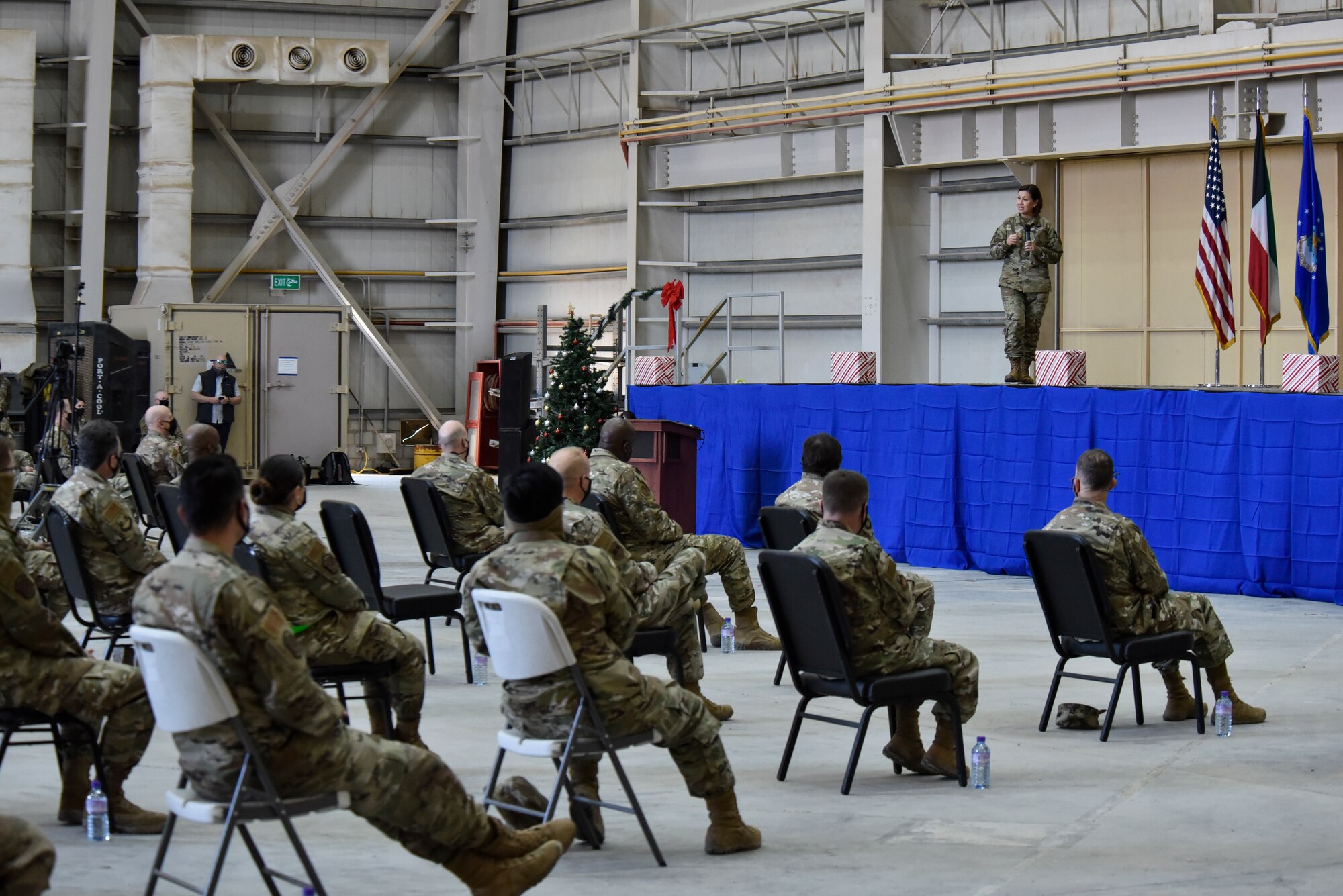 Chief Master Sergeant of the Air Force JoAnne S. Bass talks with Airmen during an all call at Ali Al Salem Air Base, Kuwait, Dec. 22, 2020. Senior leaders took time to thank ASAB Airmen for their service and sacrifice during the holiday season, as the nation cannot compete, deter and win without their dedication. (U.S. Air Force photo by Staff Sgt. Kenneth Boyton)