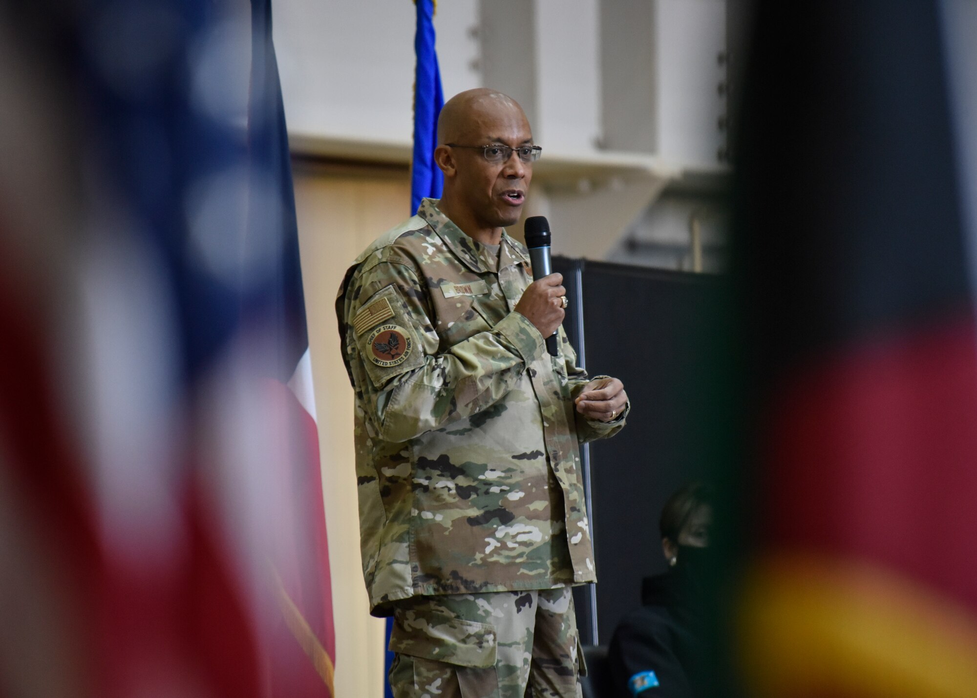 U.S. Air Force Chief of Staff Gen. Charles Q. Brown, Jr. talks with Airmen during an all call at Ali Al Salem Air Base, Kuwait, Dec. 22, 2020. Senior leaders took time to thank ASAB Airmen for their service and sacrifice during the holiday season, as the nation cannot compete, deter and win without their dedication. (U.S. Air Force photo by Staff Sgt. Kenneth Boyton)