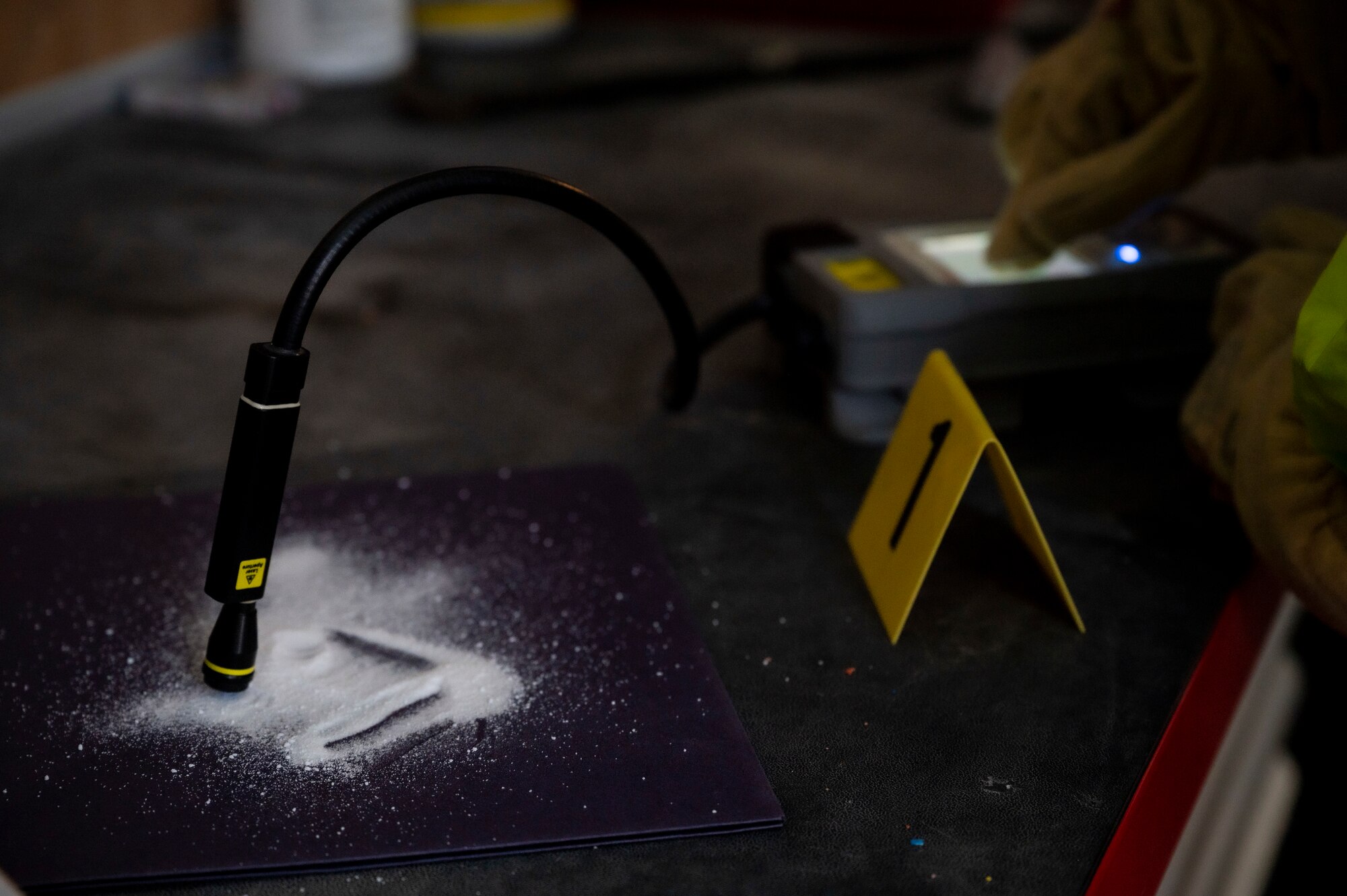 A simulated unknown substance is tested and collected during a hazardous material (HAZMAT) exercise at Al Dhafra Air Base, United Arab Emirates, Dec. 18, 2020.