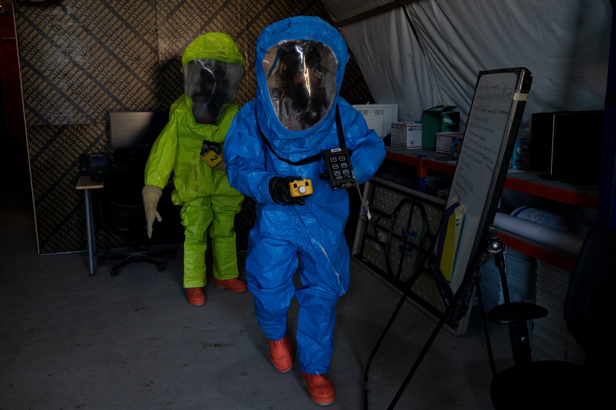 U.S. Airmen assigned to the 380th Expeditionary Civil Engineer Squadron emergency management (EM) flight conduct a hazardous material (HAZMAT) exercise at Al Dhafra Air Base, United Arab Emirates, Dec. 18, 2020.