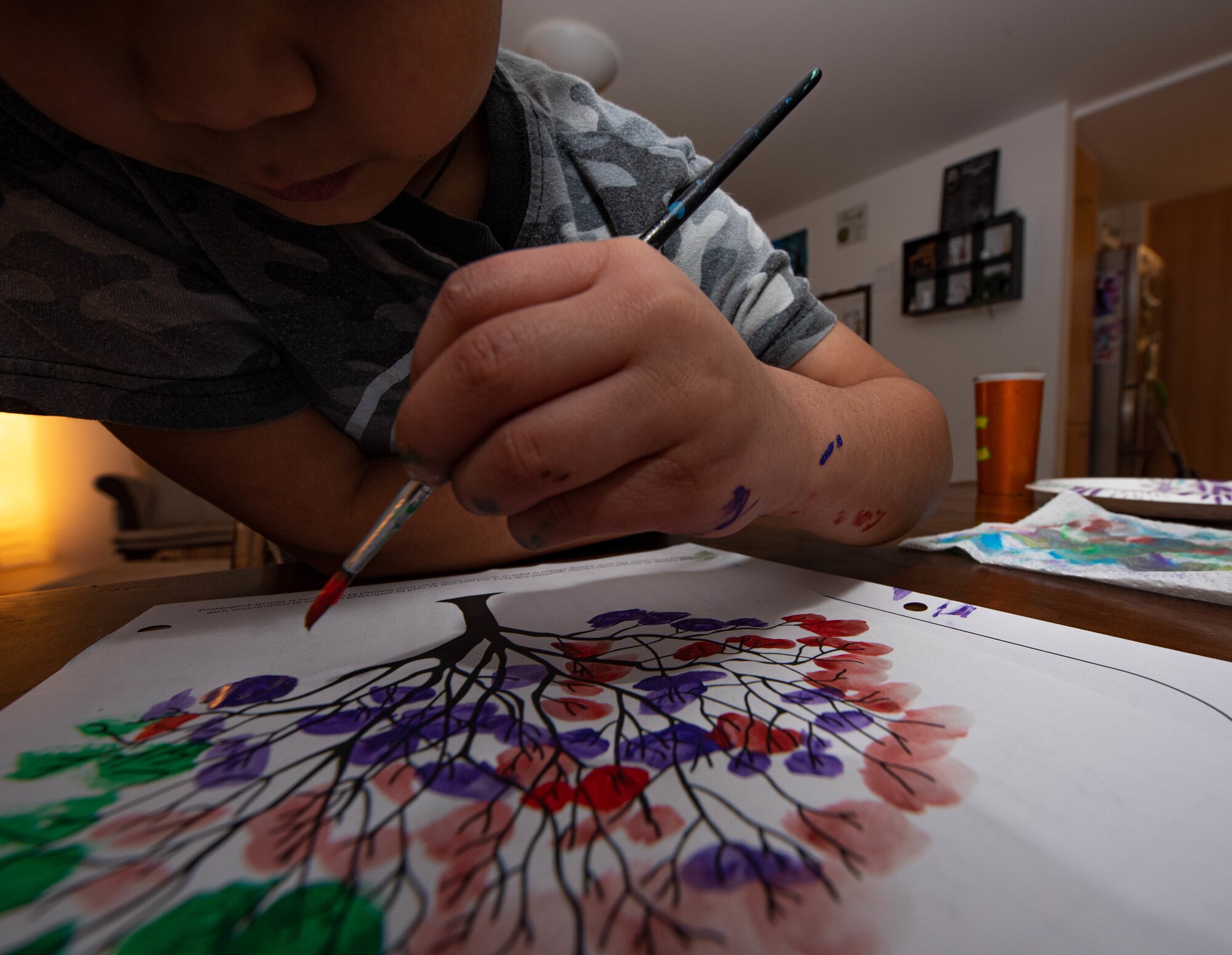 Photo of boy painting