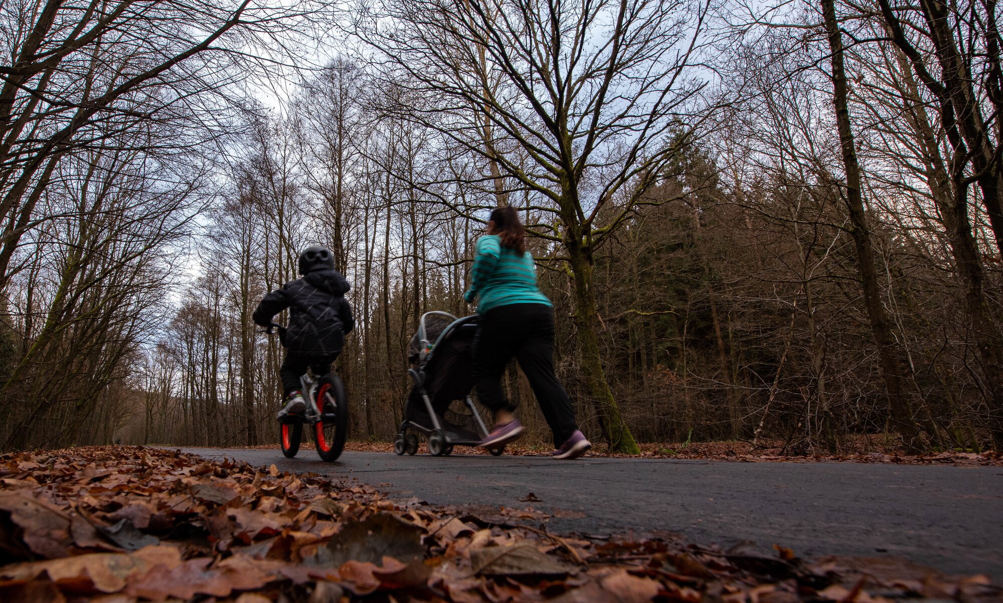 Photo of mom and son jogging