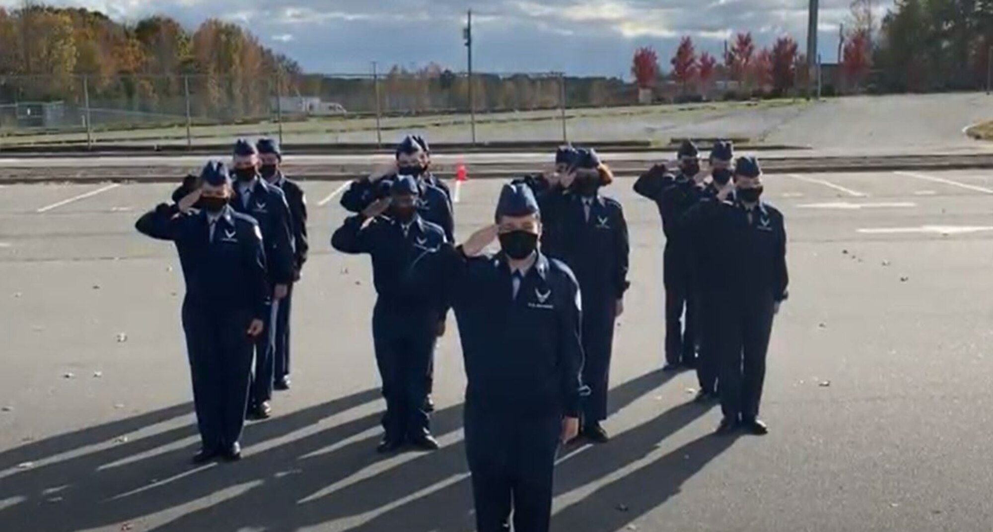 A Clover High School Air Force Junior Reserve Officer Training Guard drill team render a salute during their competition video recording in Clovis, South Carolina. Participating teams recorded their drill events prior to the submission date, to ensure the competition could take place safely amid the COVID pandemic.