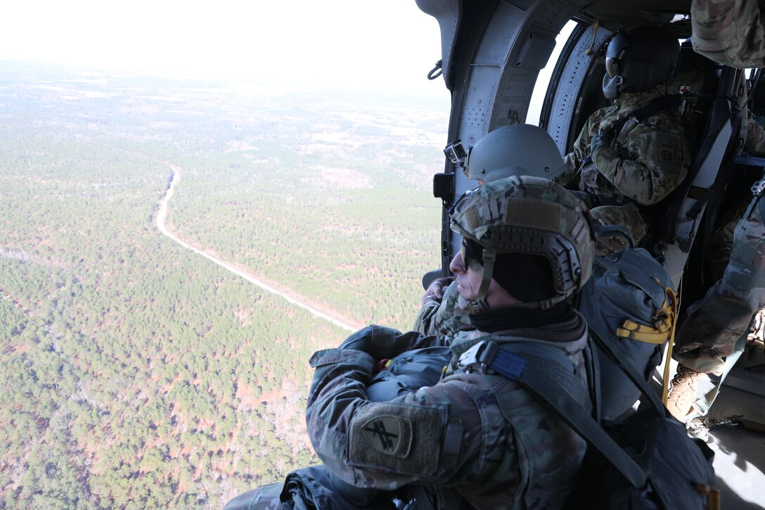 U.S. Army Reserve Maj. Sean P. Howen prepares to conduct airborne operations at Sicily Drop Zone, Fort Bragg, N.C., Dec. 3, 2020, during non-tactical airborne operations hosted by the U.S. Army Reserve's U.S. Army Civil Affairs and Psychological Operations Command (Airborne) and the 82nd Airborne Division.