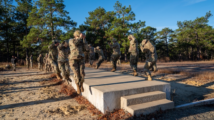 U.S. Army paratroopers prepare to conduct airborne operations at Sicily Drop Zone, Fort Bragg, N.C., Dec. 3, 2020, during non-tactical airborne operations hosted by the U.S. Army Reserve's U.S. Army Civil Affairs and Psychological Operations Command (Airborne) and the 82nd Airborne Division.