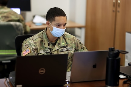 Sgt. Micheal Gibbs, a cybersecurity analyst with the North Carolina Army National Guard's 883rd Combat Engineer Company, monitors networks Nov. 2, 2020, while assisting the Cyber Security Response Force in their support of the State Board of Elections before Election Day. Gibbs was on a National Guard team that earned top national honors at the 5th Annual SANS Institute NetWars DoD Services Cup Championship Dec. 17-18.