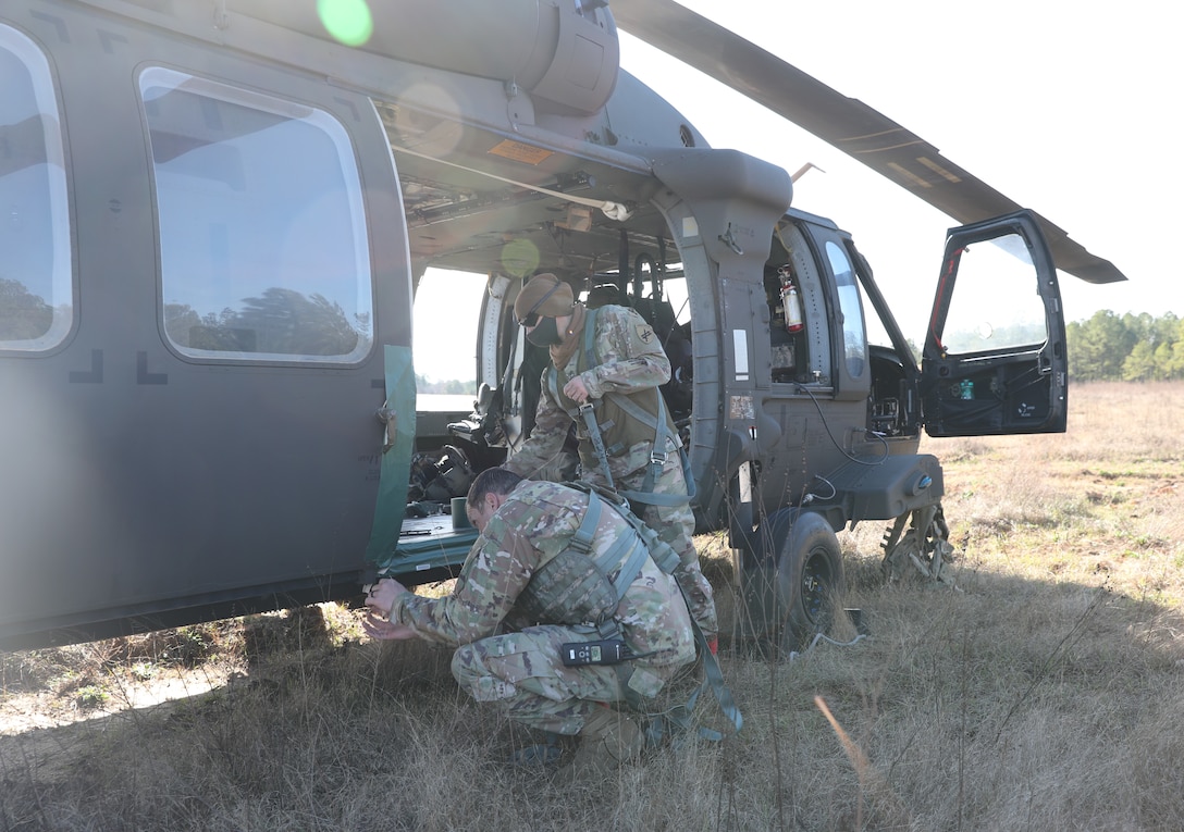 U.S. Army paratroopers prepare to conduct airborne operations at Sicily Drop Zone, Fort Bragg, N.C., Dec. 3, 2020, during non-tactical airborne operations hosted by the Army Reserve's U.S. Army Civil Affairs and Psychological Operations Command (Airborne) and the 82nd Airborne Division.