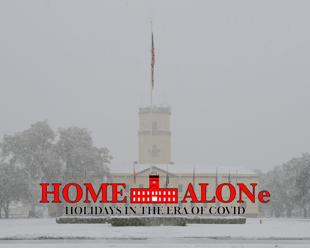 The 2nd Bomb Wing headquarters building is laden with snow after a winter storm on Barksdale Air Force Base, La., Feb. 25, 2015.