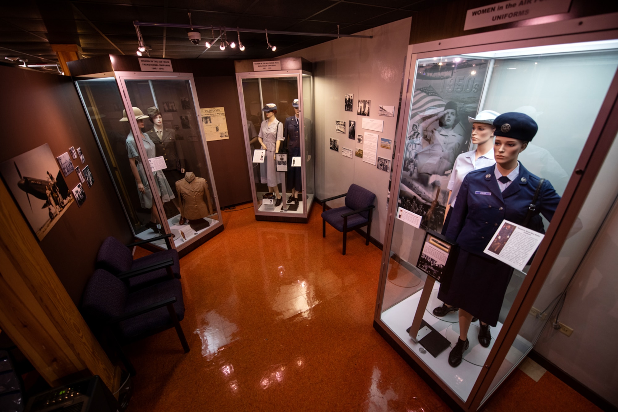 The WAF gallery consists of mannequins dressed in various WAF uniforms from the 40s through the 80s, photos and artifacts.