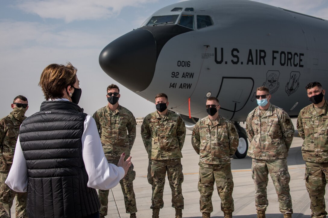 Secretary of the Air Force Barbara Barrett speaks to 379th Air Expeditionary Wing Airmen in front of an aircraft