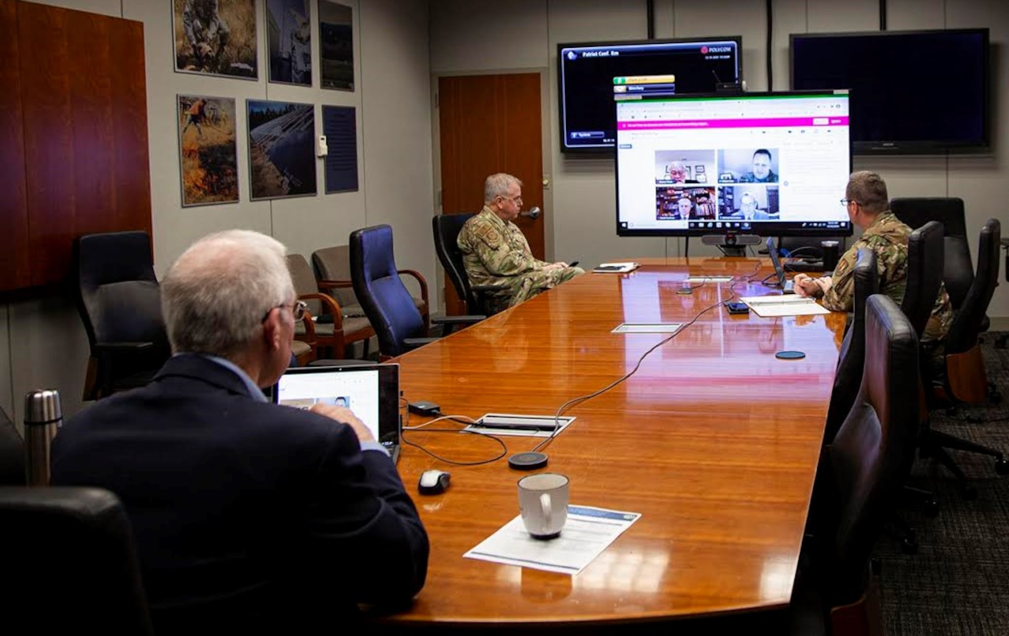 Participants watch virtual symposium