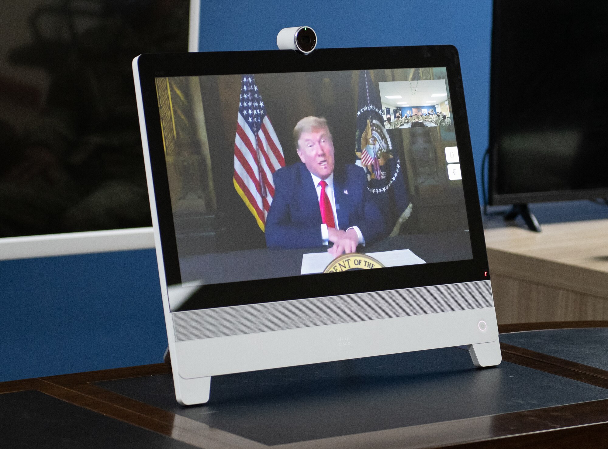 President Donald J. Trump speaks with Airmen from the 378th Expeditionary Civil Engineer Squadron during a conference call, Dec. 25, 2020, at Prince Sultan Air Base, Kingdom of Saudi Arabia.
