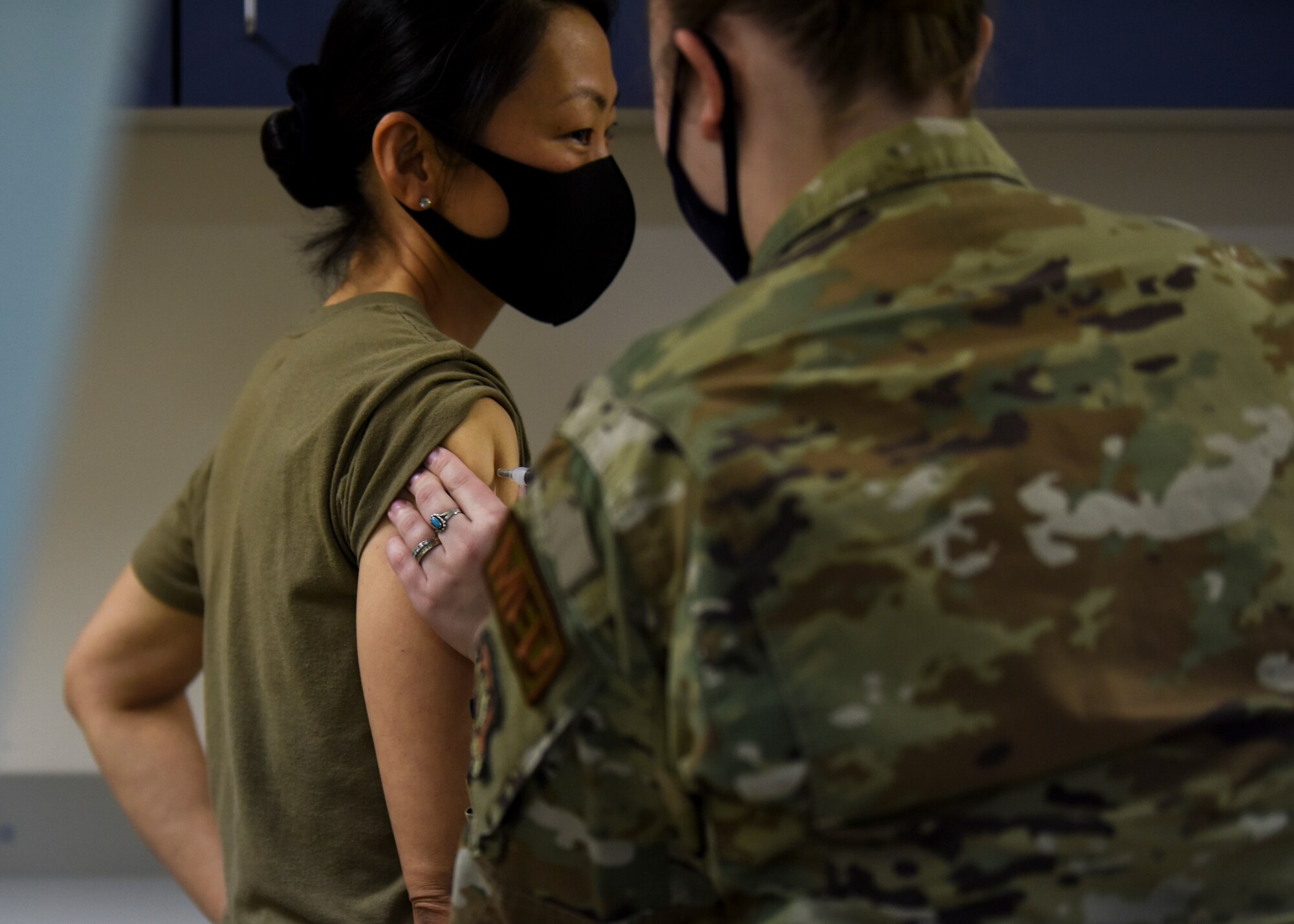 U.S. Air Force Col. Melissa J. Dooley, 35th Medical Group commander, receives a dose of the COVID-19 vaccine at Misawa Air Base, Japan, Dec. 28, 2020. Full-scale, unrestricted vaccine availability to Department of Defense personnel, similar to the annual influenza vaccine program, is predicted to be accomplished before or by mid-2021. (U.S. Air Force photo by Staff Sgt. Grace Nichols)