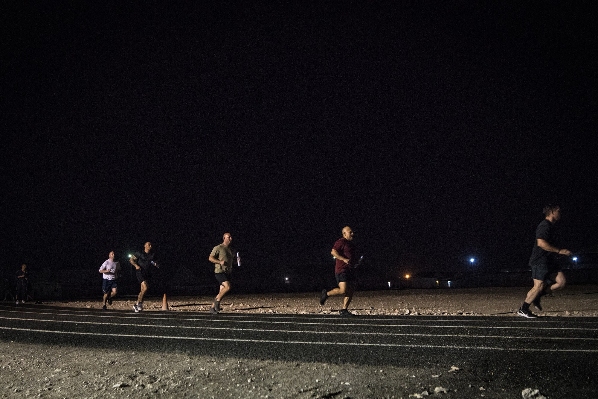 people run on a track