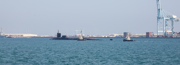 201223-A-HS292-1033 GULF OF BAHRAIN (Dec. 23, 2020) The guided-missile submarine USS Georgia (SSGN 729) transits the Gulf of Bahrain, inbound to a sustainment and logistics visit in Manama, Bahrain, Dec. 23. Georgia is deployed to the U.S. 5th Fleet area of operations in support of naval operations to ensure maritime stability and security in the Central Region, connecting the Mediterranean and Pacific through the Western Indian Ocean and three critical chokepoints to the free flow of global commerce.