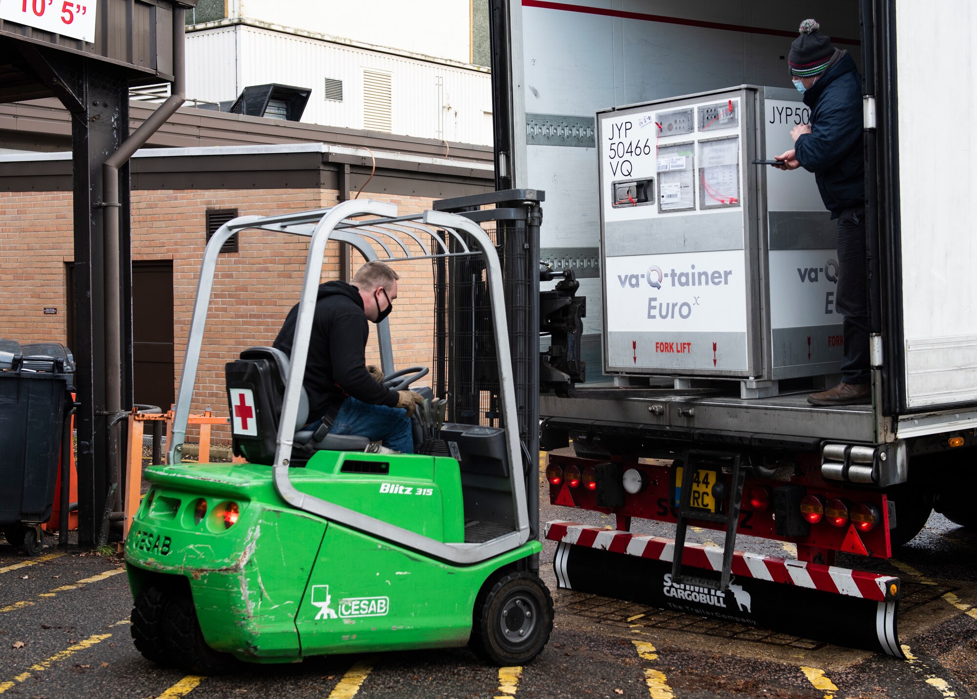 The 48th Fighter Wing received its first shipment of COVID-19 vaccinations at Royal Air Force Lakenheath, England, Dec. 27, 2020. The United States Government has purchased the vaccines and is making them available to the Department of Defense for distribution and administration to DoD personnel. (U.S. Air Force photo by Airman 1st Class Jessi Monte)