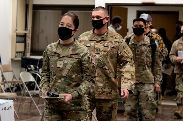 Members of Team Osan prepare to receive the first round of the Moderna COVID-19 vaccine at Osan Air Base, Republic of Korea, Dec. 29, 2020.