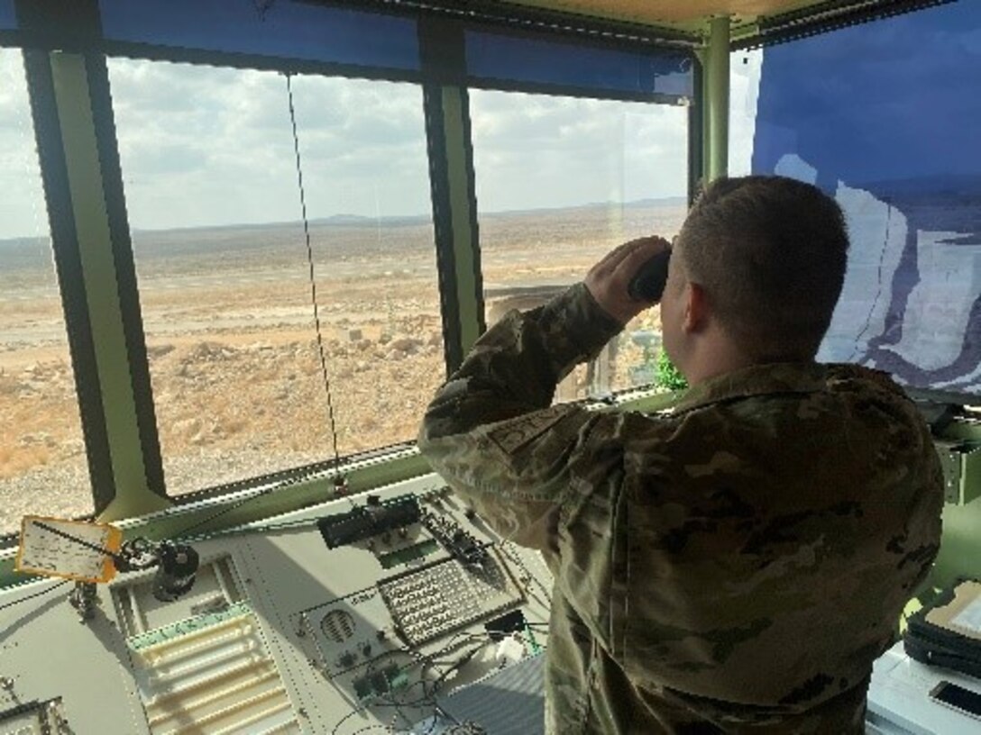A U.S. Air Force Airman assigned to the 776th Expeditionary Air Base Squadron Airfield Operations Flight surveys a runway Dec. 20, 2020, at Chabelley Air Base, Djibouti. The AOF is responsible for not only coordinating over 36,000 flying hours per year, but also executing Africa’s largest remotely piloted aircraft mission.