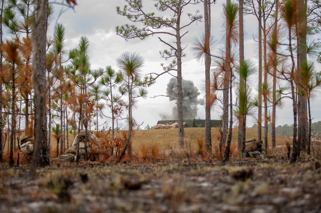 U.S. Marines conduct a maneuver under fire during live-fire training at the G-36 company assault range on Marine Corps Base Camp Lejeune, N.C., Dec. 12.