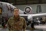 Senior Airman Jayme Bradley, an electrical and environmental specialist for the 175th Maintenance Squadron, Maryland National Guard, poses in front of an A-10C Thunderbolt II aircraft Dec. 18, 2020, at the Warfield Air National Guard Base at Martin State Airport, Middle River, Md. Bradley is the only full-time female Airman in her shop in the male-dominated career field of aircraft maintenance.