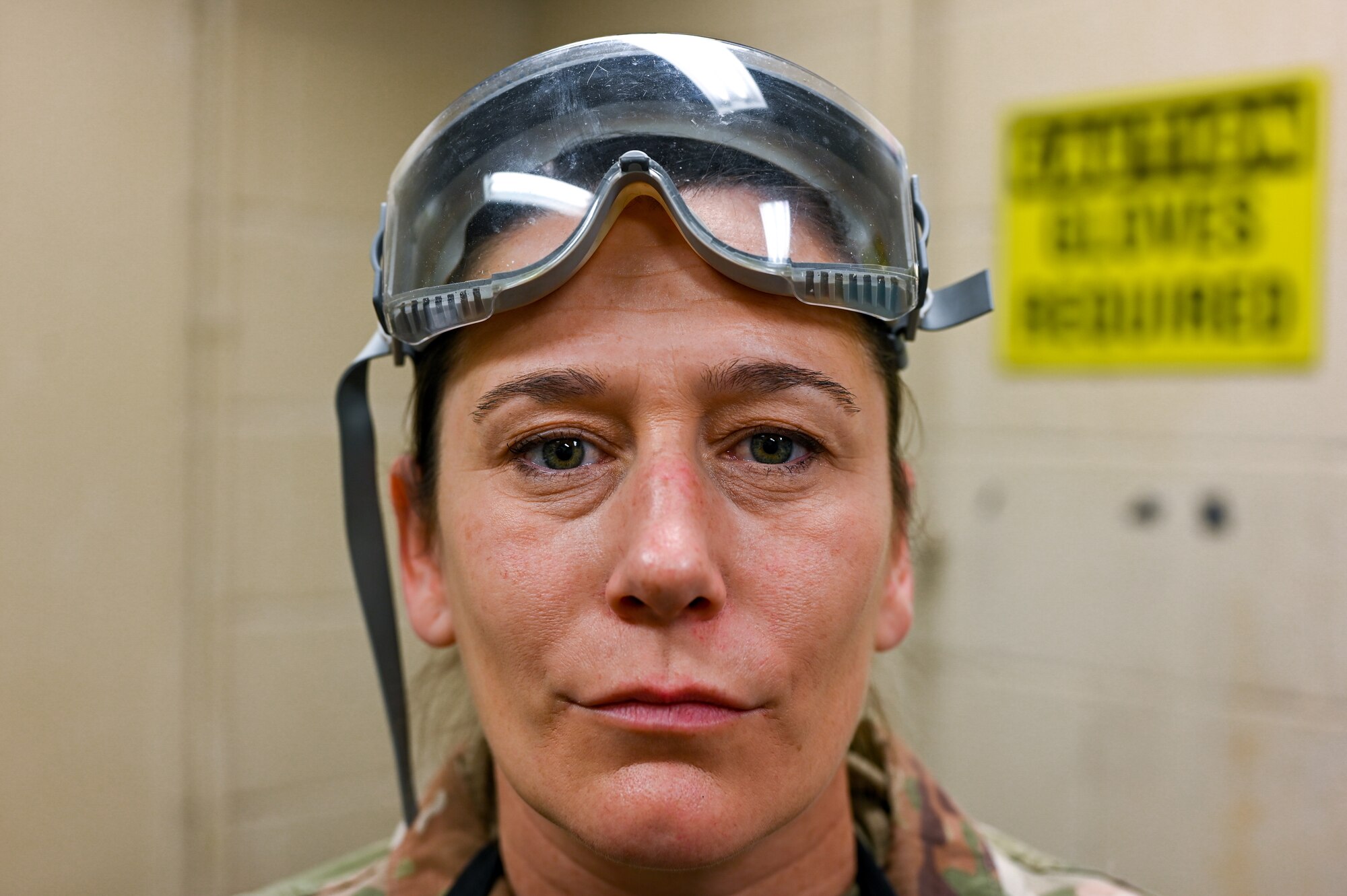 Senior Airman Jayme Bradley, an electrical and environmental specialist for the 175th Maintenance Squadron, Maryland National Guard, poses for a photo after testing the batteries of an A-10C Thunderbolt II aircraft Dec. 23, 2020 at the Warfield Air National Guard Base at Martin State Airport, Middle River, Md.