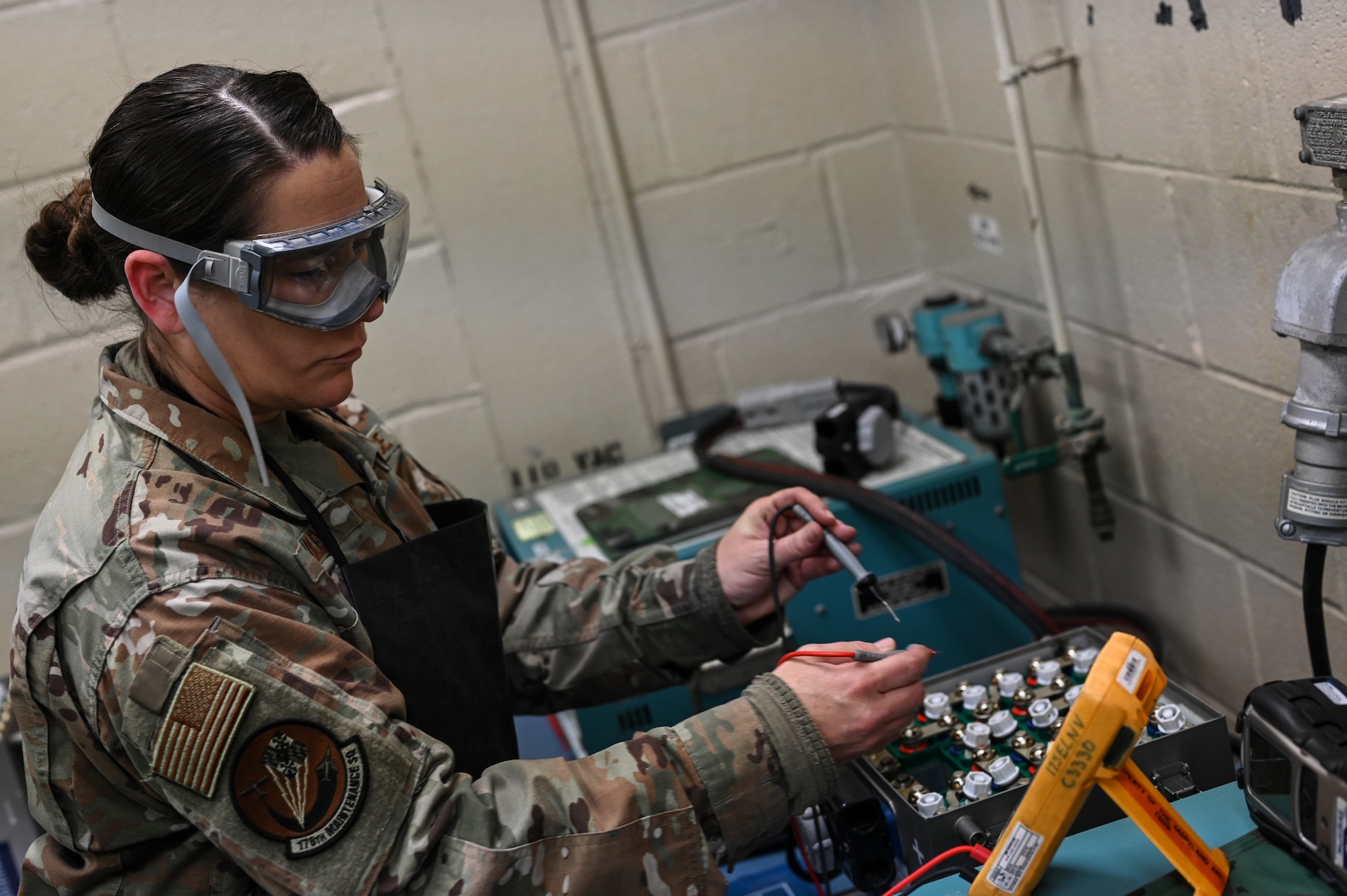 Senior Airman Jayme Bradley, an electrical and environmental specialist for the 175th Maintenance Squadron, Maryland National Guard, tests the batteries of an A-10C Thunderbolt II aircraft Dec. 18, 2020 at the Warfield Air National Guard Base at Martin State Airport, Middle River, Md.