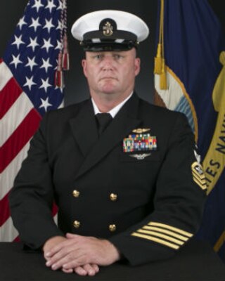 Official biography photo of Senior Chief Adrian A. Santini, Command Senior Chief, Helicopter Maritime Strike Weapons School Pacific.