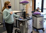 A Xenex representative demonstrates the capabilities of new germ-zapping robots that will help in the fight against COVID-19 at NMCCL.