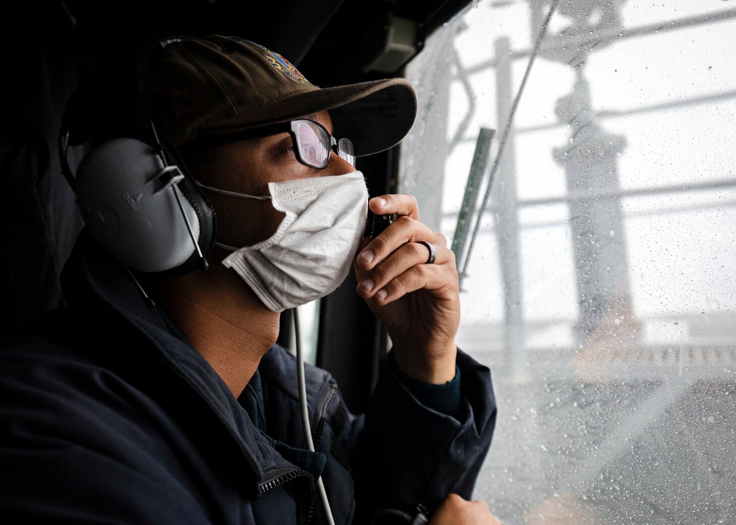 TAIWAN STRAIT (Dec. 30, 2020) Boatswain’s Mate 3rd Class Kristopher Allen, from Disputanta, Virginia, stands watch as bridge lookout in the pilot house aboard guided-missile destroyer USS John S. McCain (DDG 56) while the ship conducts routine underway operations in support of stability and security for a free and open Indo-Pacific. Sea control is foundational for all other naval missions that support the Joint Force, including power projection.