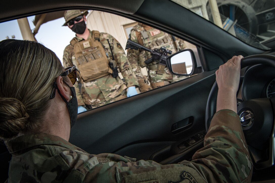 person in car talks to person outside window