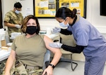 The U.S. Army Health Clinic Kaiserslautern conducted its first inoculations of healthcare workers with the Moderna COVID-19 vaccine on Dec. 30. Clinic Commander Maj. Shara Fisher, a family nurse practitioner, was first the receive the vaccine.