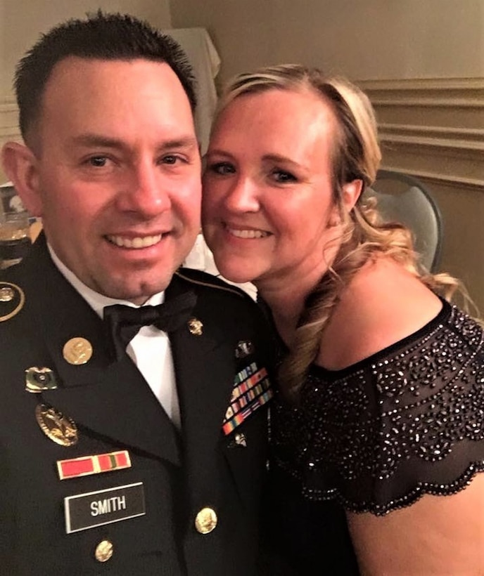 Sgt. 1st Class James Smith and Sarah Smith pose for a photograph during a 2016 military ball at Fort Lee, Virginia. Smith took part in the 94th Training Force Sustainment Headquarters and Headquarters Company virtual suicide prevention training, where she shared her story about the loss of her husband due to suicide. The 94th TD-FS HHC suicide prevention training was conducted on October 24, 2020. (Photo courtesy of Sarah Smith, widow of service member)