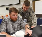 The training helped civilians, Arkansas National Guard members and federal employees practice cybersecurity countermeasures in a simulated scenario.