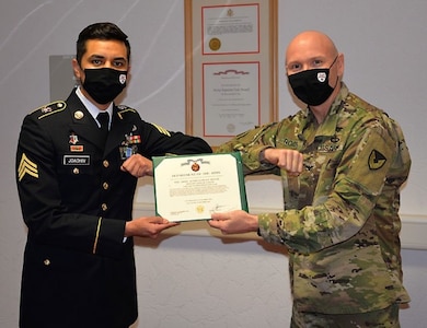 Sgt. Jose Luis Joachin, left, is pictured with Col. Shane Roach, commander of the U.S. Army Medical Materiel Center-Europe, after being recognized as USAMMC-E’s NCO of the Quarter.