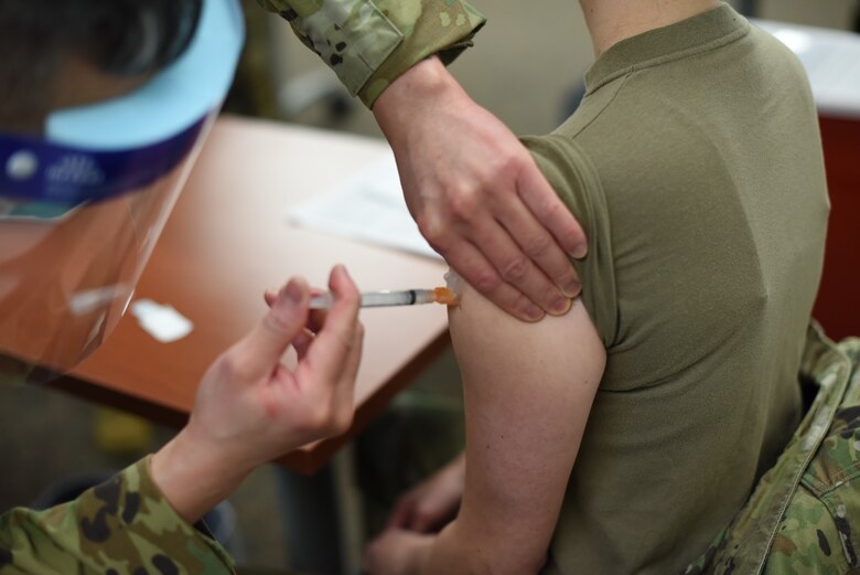 Members from the 341st Missile Wing Medical group receive the first round of COVID-19 vaccines, Dec. 31, 2020 at Malmstrom Air Force Base, Mont.