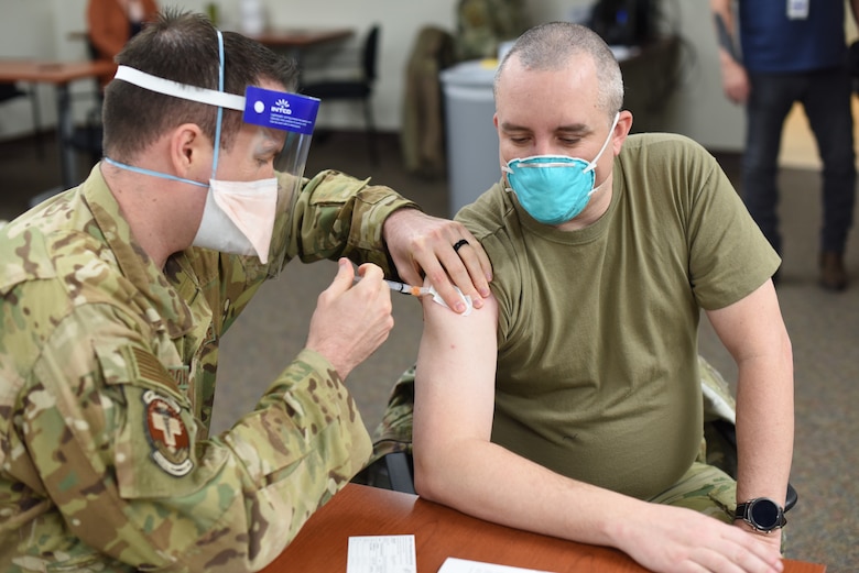 Members from the 341st Missile Wing Medical group receive the first round of COVID-19 vaccines, Dec. 31, 2020 at Malmstrom Air Force Base, Mont.
