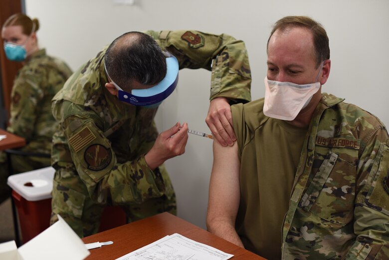 Members from the 341st Missile Wing Medical group receive the first round of COVID-19 vaccines, Dec. 31, 2020 at Malmstrom Air Force Base, Mont.