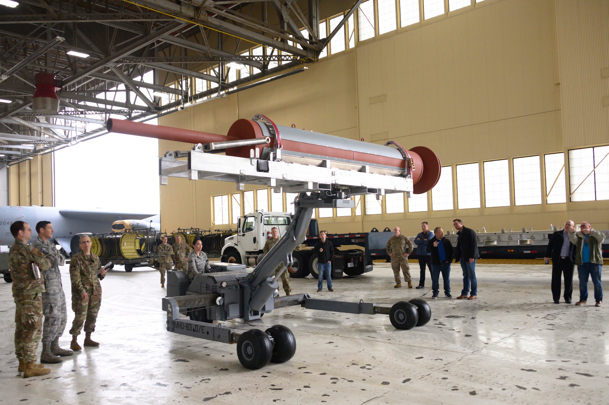 Airmen inspect a bomb load