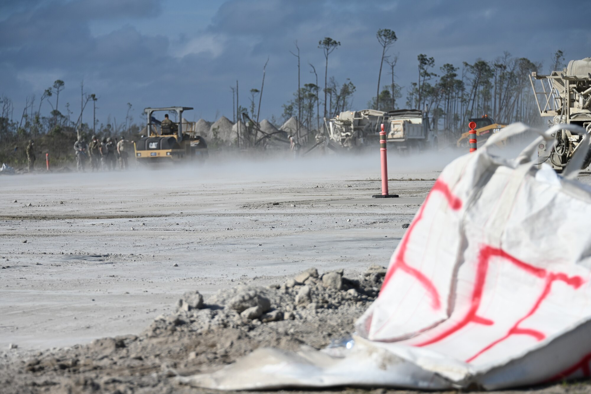 Airmen repair a runway