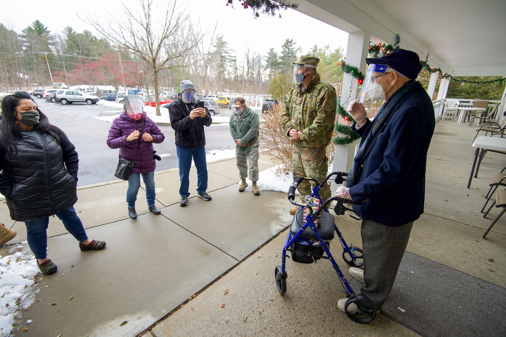 World War II veteran Lenny Roberge, Vermont’s oldest living veteran, says a few words of thanks to the Airmen of the Vermont Air National Guard at a small ceremony outside his nursing home in South Burlington, Vt., Dec. 22, 2020. In order to honor Roberge, Airmen from the 158th Fighter Wing had a flag flown in an F-35 during a combat training sortie over the mountains of Vermont and New York. (U.S. Air National Guard photo by Senior Master Sgt. Michael Davis)