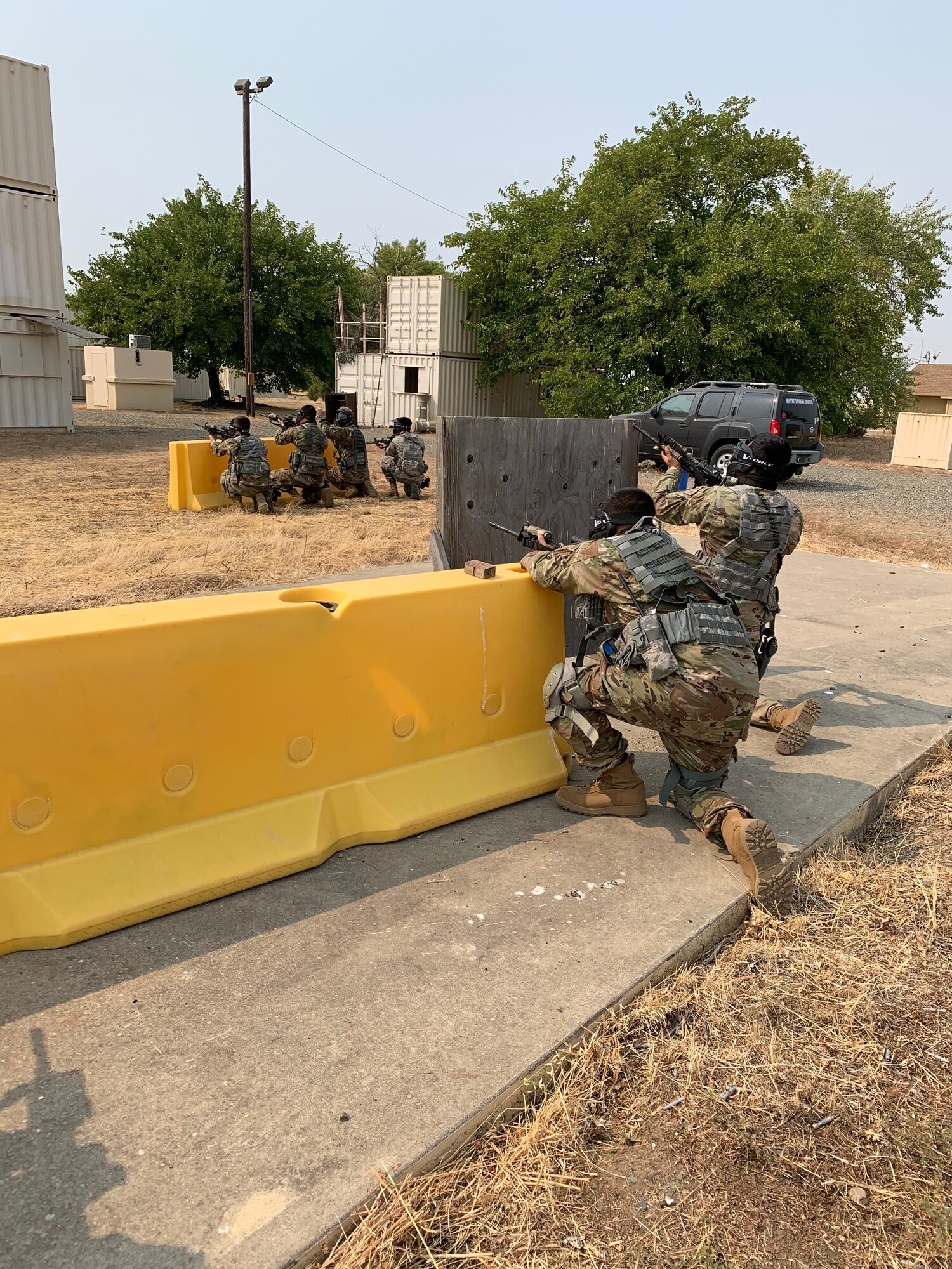 Genesis students from the 940th Security Forces Squadron train to use bounding techniques to safely get to their target building before clearing the area in spring 2020 at Beale Air Force Base, California.