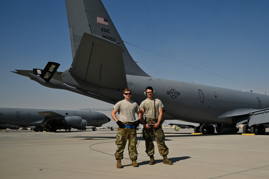 U.S. Air Force Staff Sgt. Taylor Bean, left, and U.S. Air Force Senior Airman Mason Schumm, KC-135 Stratotanker launch crew members with the 385th Expeditionary Maintenance Squadron, pose for a portrait before launching a U.S. Air Force KC-135 Stratotanker for a mission at Al Udeid Air Base, Qatar, Jan. 17, 2020.