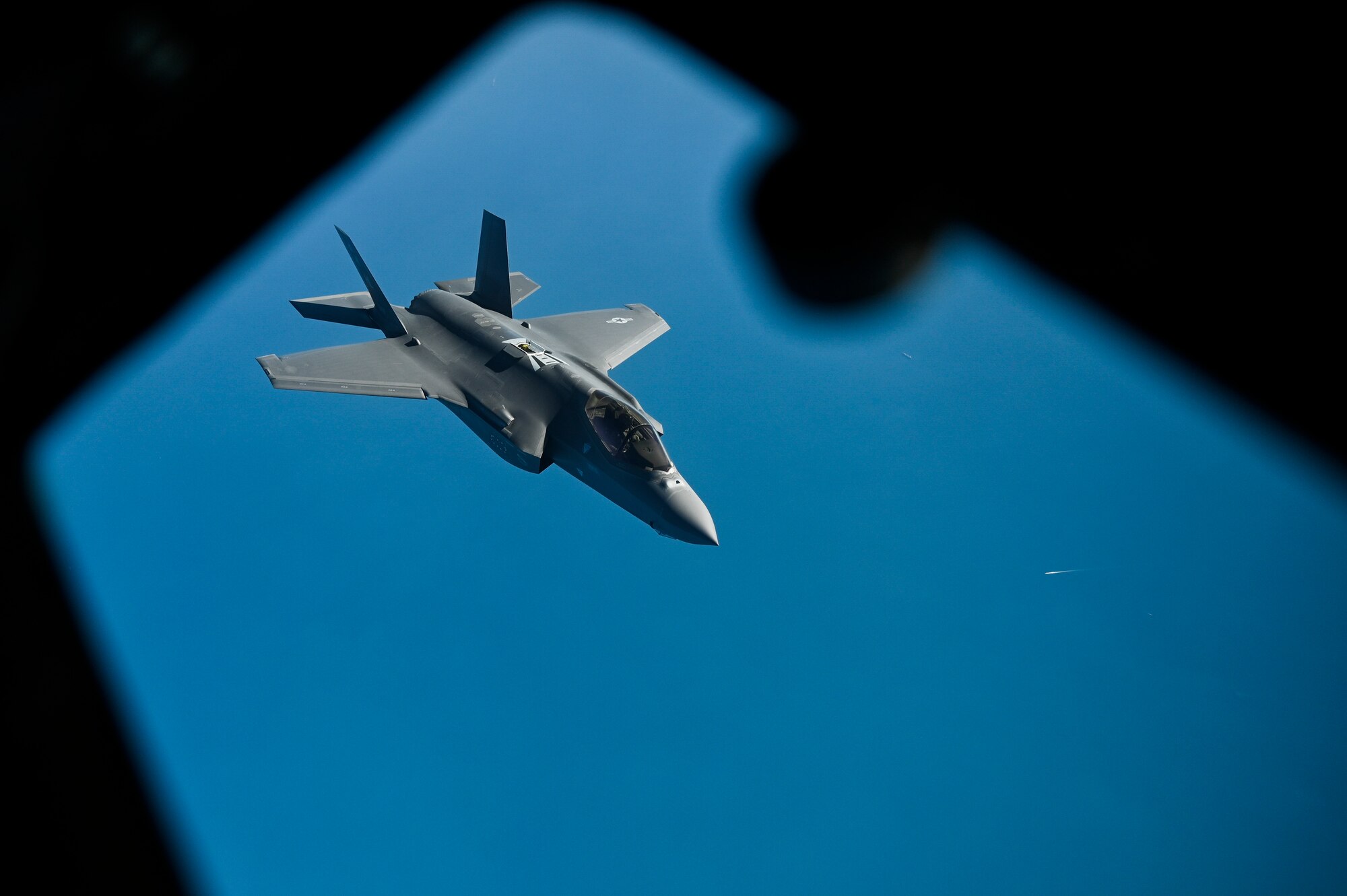A U.S. Air Force F-35A Lighting II flies over the Arabian Gulf during an in-air refueling mission with a U.S. Air Force KC-135 Stratotanker assigned to the 28th Expeditionary Air Refueling Squadron, deployed to Al Udeid Air Base, Qatar, Jan. 17, 2020.