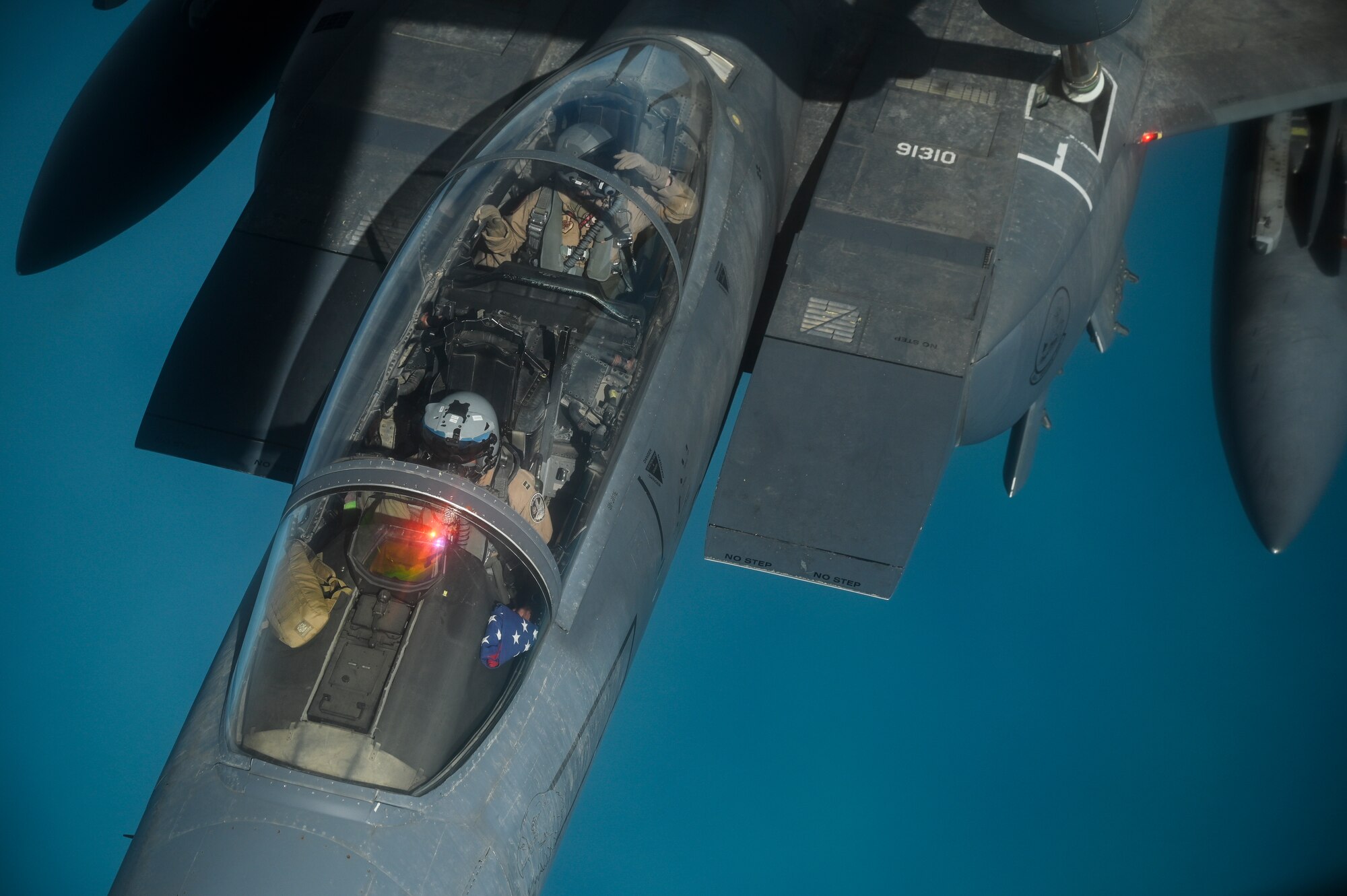 A U.S. Air Force F-15E Strike Eagle receives fuel from a U.S. Air Force KC-135 Stratotanker assigned to the 28th Expeditionary Air Refueling Squadron, deployed to Al Udeid Air Base, Qatar, WHERE Jan. 17, 2020.